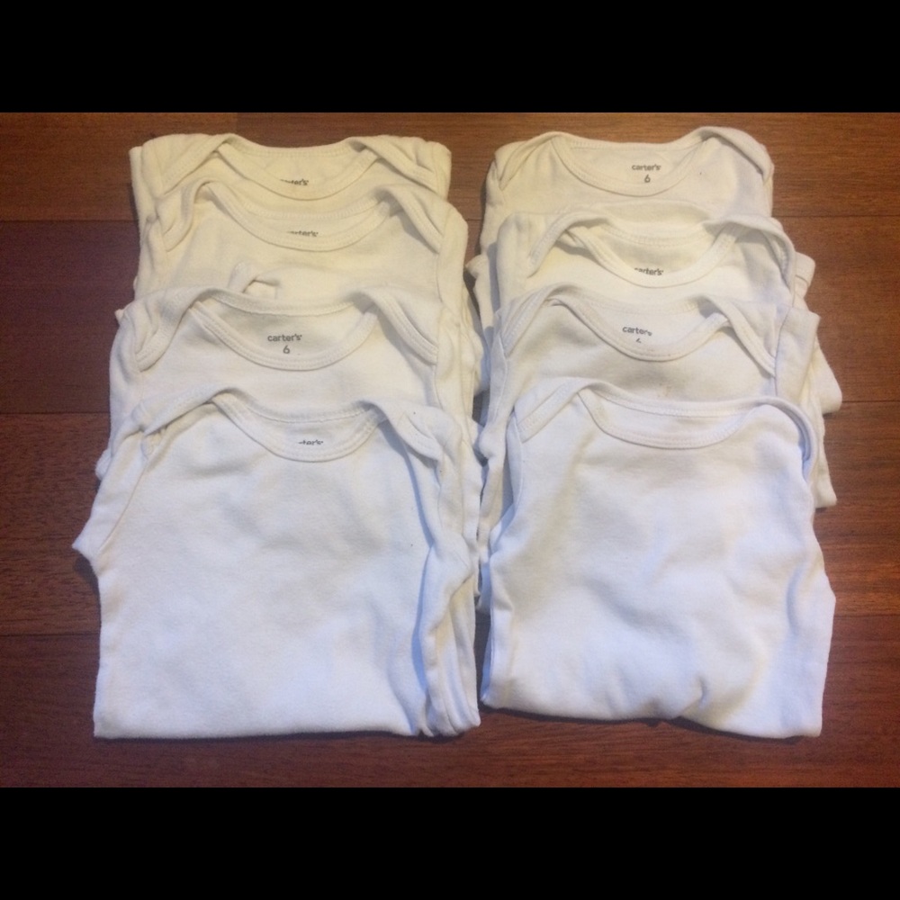 8 Carter’s long sleeve onesies